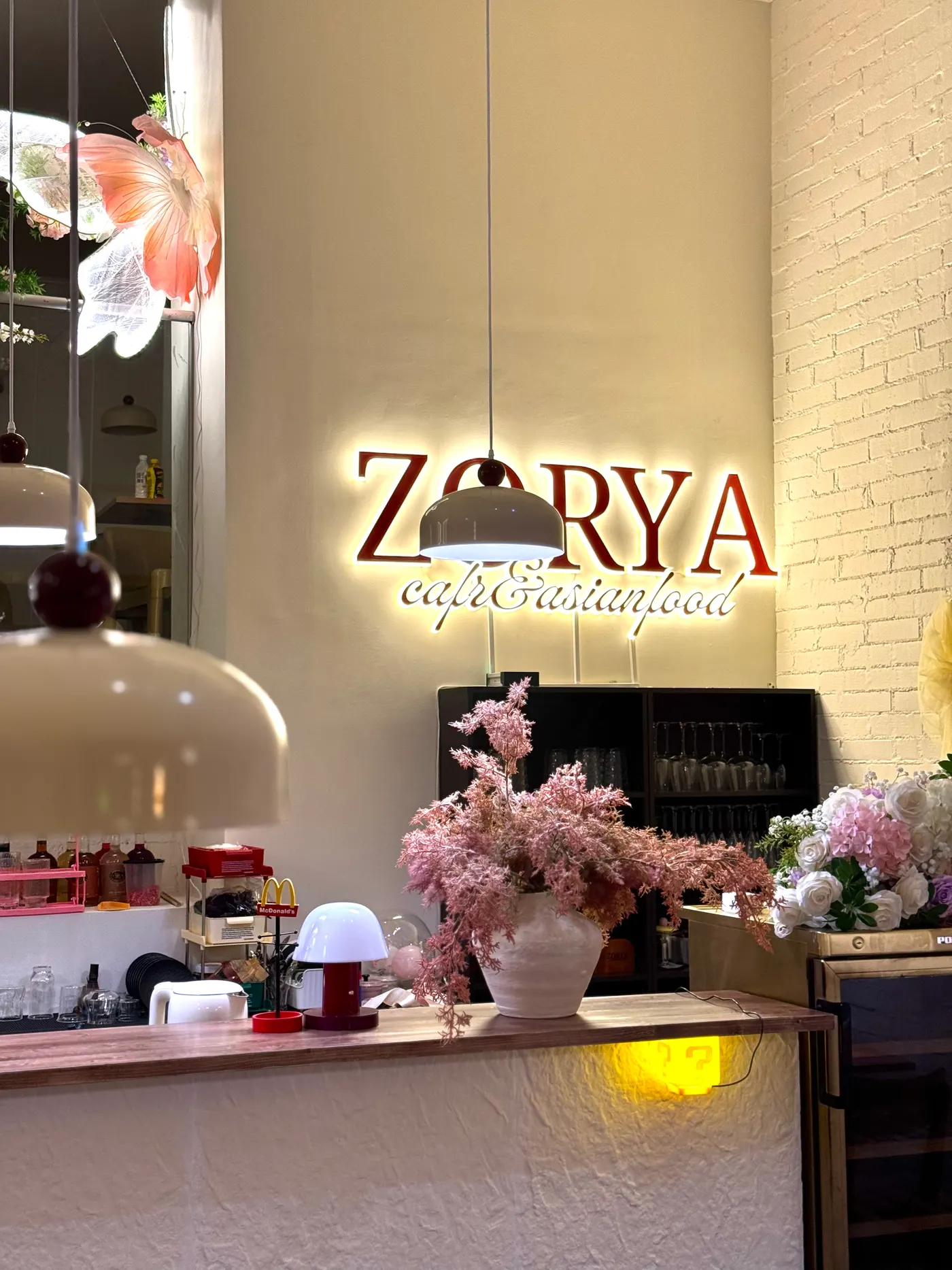 Zorya cafe counter and illuminated sign
